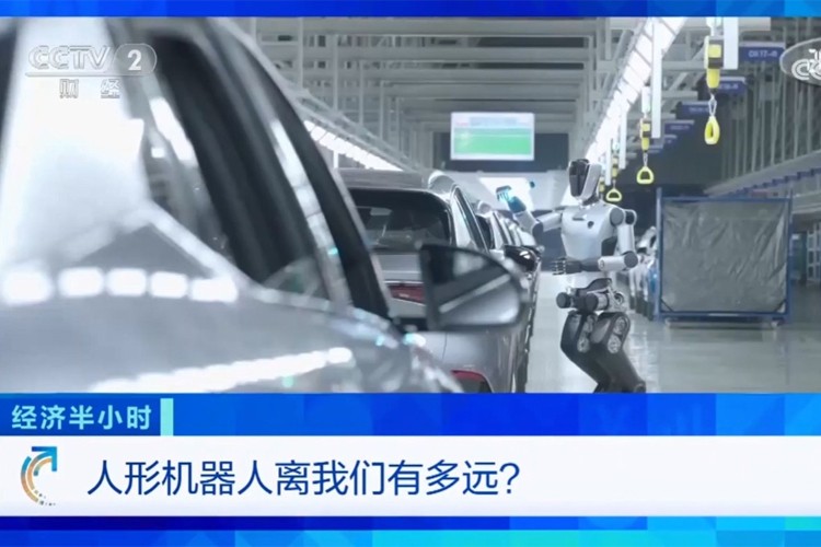 中央电视台《经济半小时》栏目对jdb电子游戏机器人的专题报道